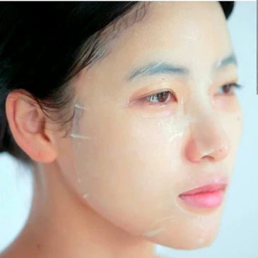 Nomierinoša auduma maska ar sastāvā iekļautu Āzijas centellu Celimax The Real Cica Calming Ampoule Mask