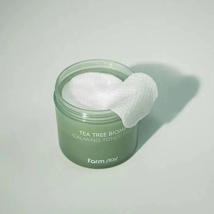 Nomierinoši spilventiņi sejas ādai FarmStay Tea Tree Biome Calming Toner Pad